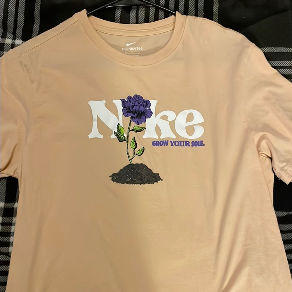 Nike Peach T-Shirt with Purple Flower Graphic